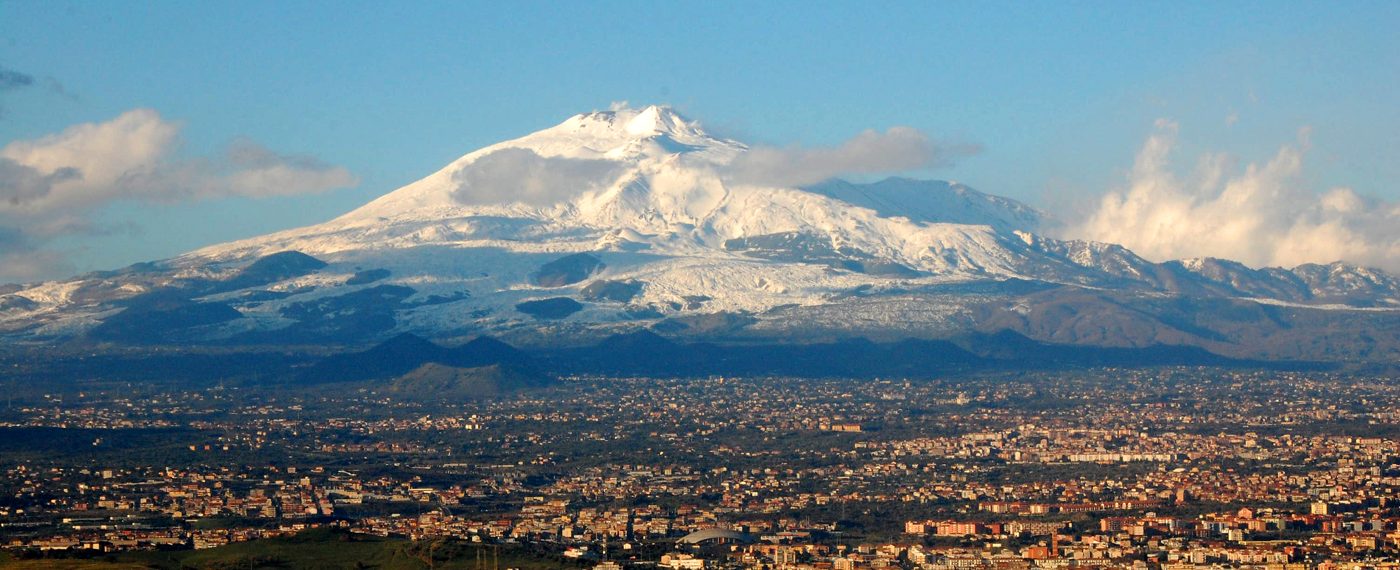 Mount Etna rising above the Sicilian coast